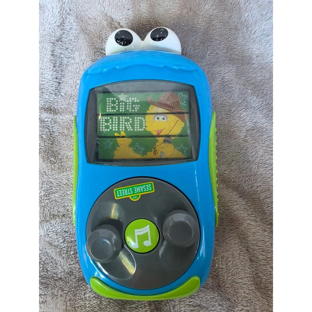 Sesame Street Cookie Monster Musical Toy Elmo Ernie Big Bird Blue Handheld 2010